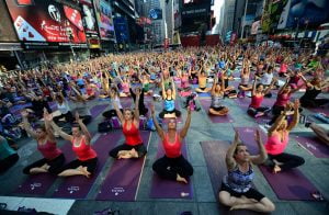 Participants take part in a mass yoga cl