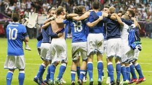 Italy's players celebrate qualifying for the final at the end of their Euro 2012 semi-final soccer match against Germany in Warsaw
