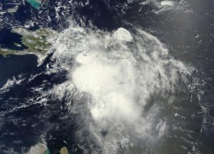 La tempesta tropicale "Erika" vista dal satellite visibile (credit NASA)